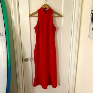 Sleek red dress with ruffled bottom